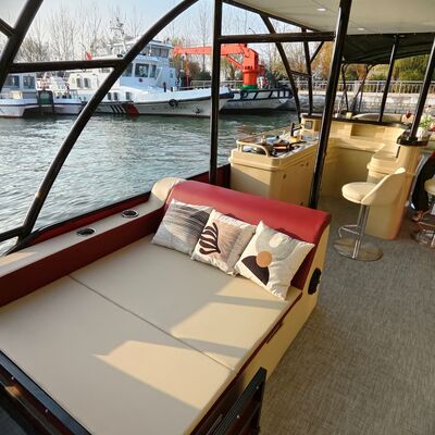 Double Decker Pontoon Boat with 12 Cup Holders and Aluminum Construction for Lightweight Durability